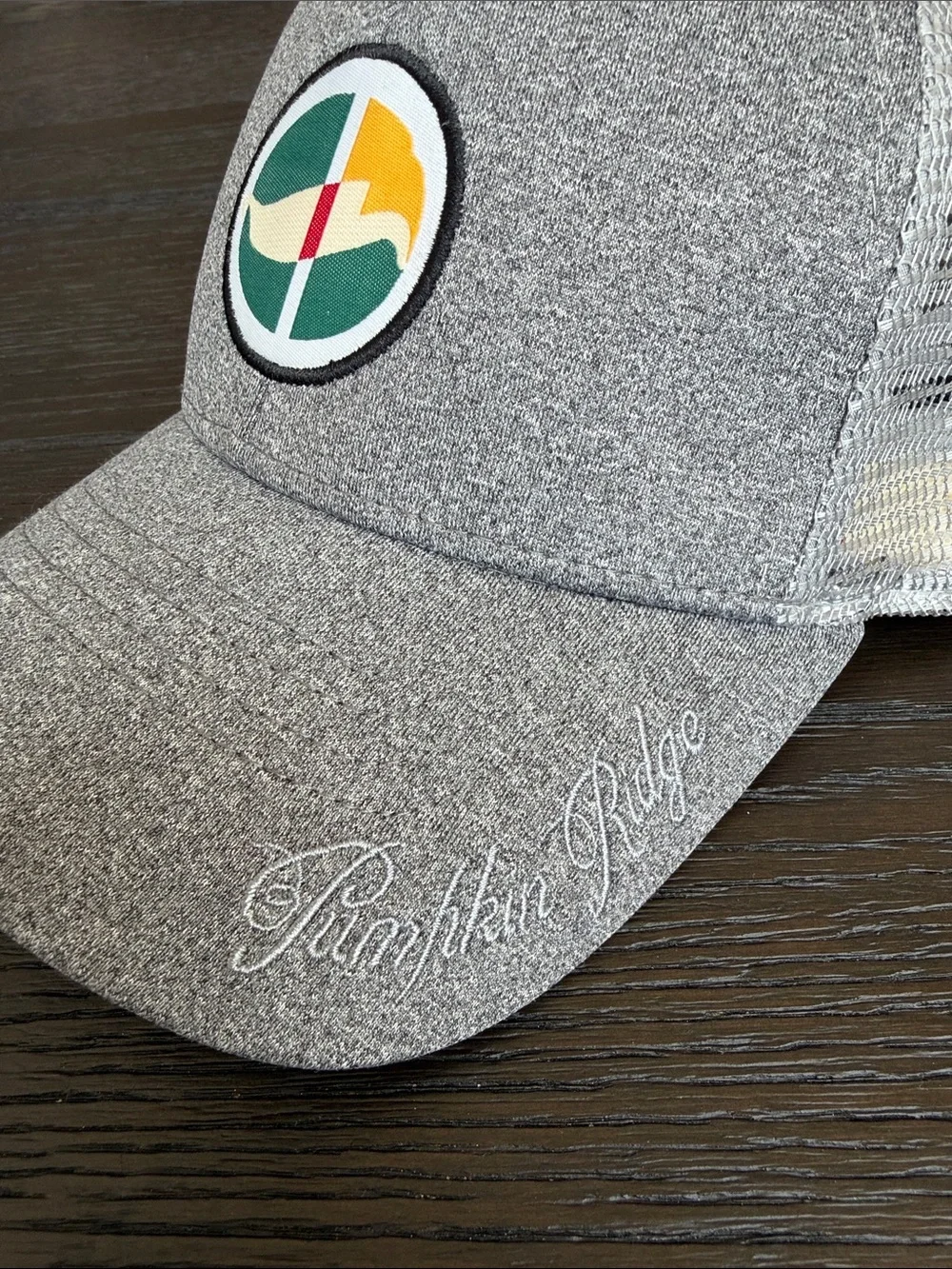Pumpkin Ridge Golf Gray Men’s Performance Trucker Cap with Green & Yellow Patch